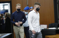 Gabriel Natale-Hjorth, right, and Finnegan Lee Elder, from California, arrive in court for a hearing in their trial where they are accused of slaying a plainclothes Carabinieri officer while on vacation in Italy last summer, in Rome, Wednesday, Sept. 16, 2020. (Remo Casilli/Pool Photo via AP)