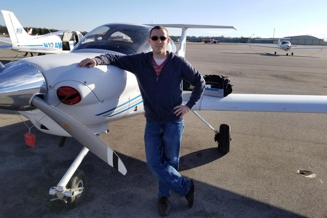 Travis Houser, recent graduate of Middle Tennessee State University’s Aeronautical Science master’s program, poses in January 2018 at the Murfreesboro Airport in Murfreesboro, Tenn., after completing his very first flight as part of one of the university’s various aviation programs.