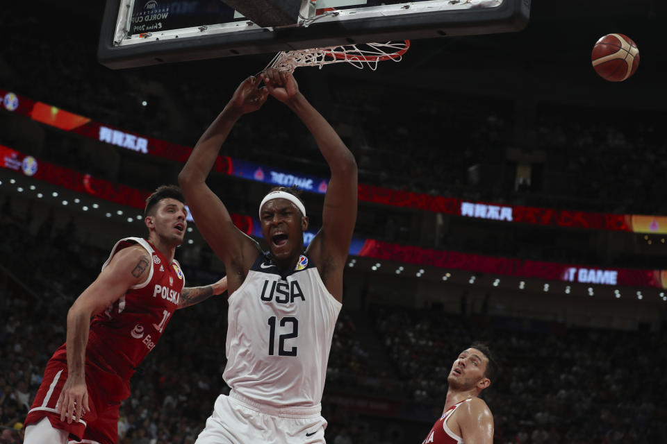 United States' Myles Turner dunks during a consolation playoff game against Poland for the FIBA Basketball World Cup at the Cadillac Arena in Beijing on Saturday, Sept. 14, 2019. U.S. defeated Poland 87-74 (AP Photo/Ng Han Guan)