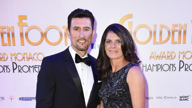 Mia Hamm, wife of Los Angeles Dodgers first baseman Nomar Garciaparra,  watches from the stands as