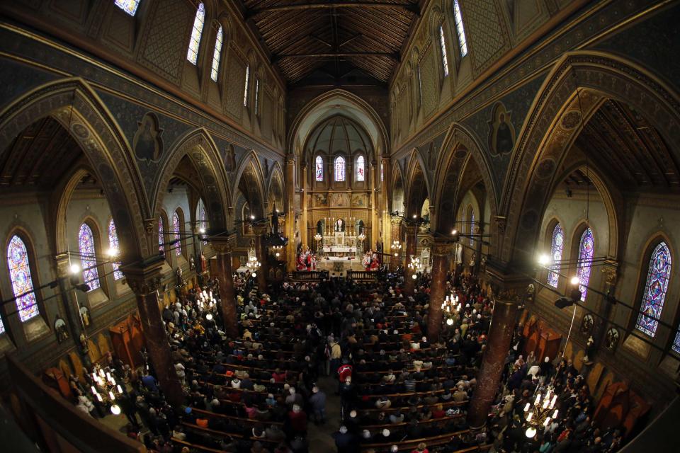 View of interior of St Joseph Cathedral during a Catholic Palm Sunday mass in Bucharest