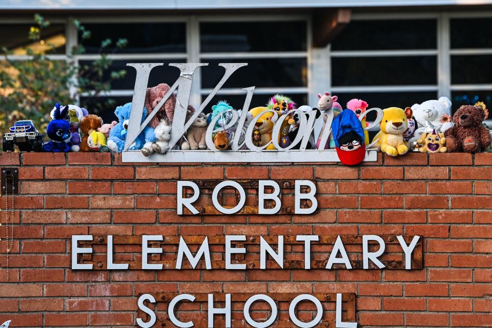 A makeshift memorial for the shooting victims outside Robb Elementary School in Uvalde is seen on May 28. 