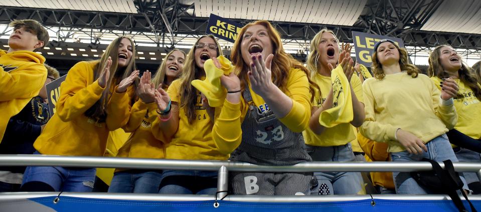 The Whiteford Bobcat student section cheers on their team against Ubly in the Division 8 State Championships at Ford Field Friday.