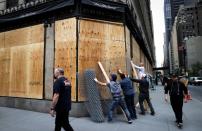 Businesses in midtown Manhattan boarded up during continued protests in New York