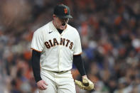 San Francisco Giants pitcher Logan Webb reacts after striking out Los Angeles Dodgers' Chris Taylor during the fifth inning of Game 5 of a baseball National League Division Series Thursday, Oct. 14, 2021, in San Francisco. (AP Photo/John Hefti)