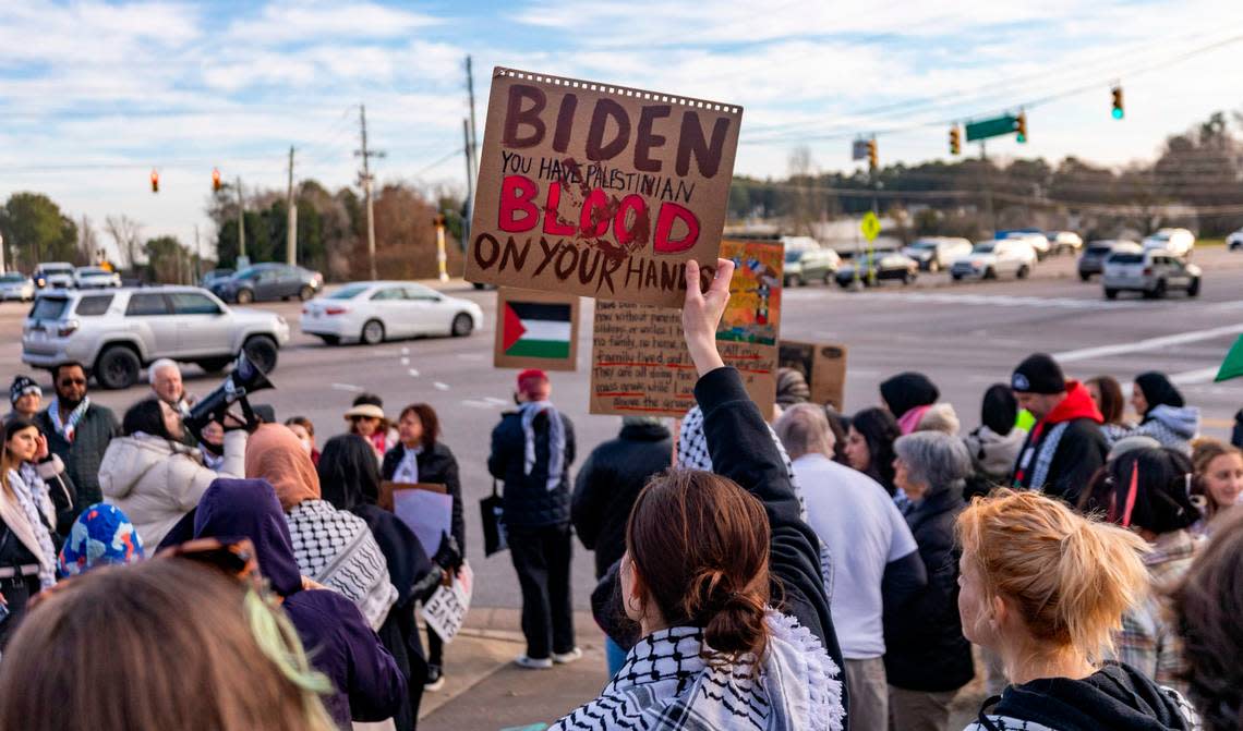 About 200 pro-Palestinian demonstrators protest President Joe Biden’s Raleigh visit at the intersection of Durant Road and Capital Boulevard on Thursday, Jan. 18, 2023. Biden spoke at the nearby Abbotts Creek Community Center Thursday where he announced plans to invest $82 million from the American Rescue Plan for affordable high speed internet for 20,000 North Carolinians.