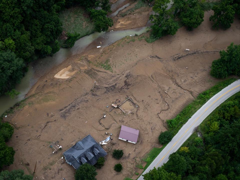 In this aerial view, flood damage is visible as the Kentucky National Guard fly a recon and rescue mission on July 30, 2022 in Breathitt County near Jackson, Kentucky (Getty Images)