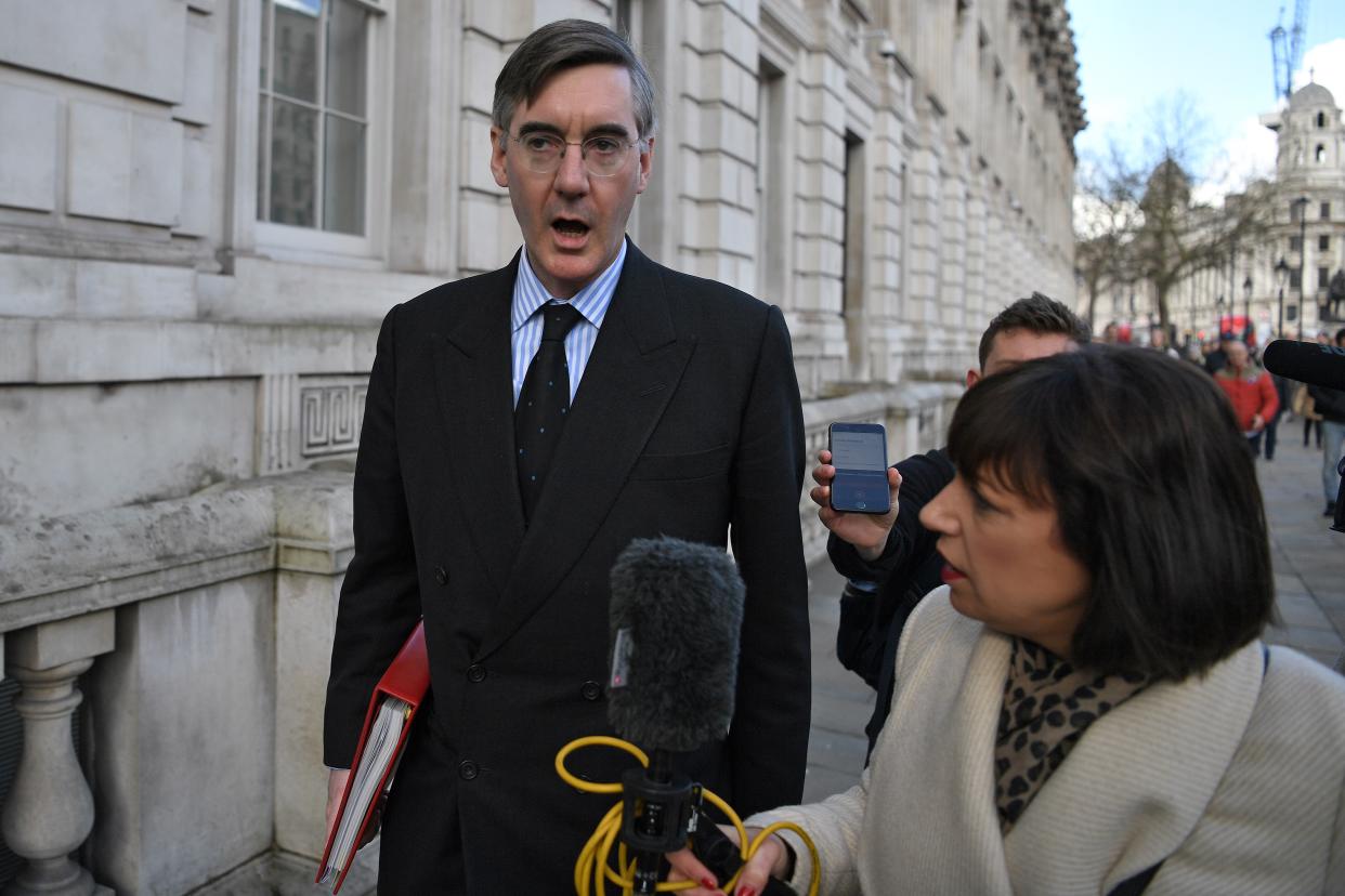 Britain's Leader of the House of Commons Jacob Rees-Mogg (L) is interviewed by Sky News journalist Beth Rigby as he leaves from the Cabinet Office on Whitehall in central London on March 2, 2020, ahead of an emergency COBRA meeting into UK's developing coronavirus COVID-19 situation. - Britain's Prime Minister Prime Minister will on Monday Chair an emergency COBRA meeting on the coronavirus outbreak, after the number of confirmed cases of COVID-19 in the United Kingdom rose to 36. (Photo by DANIEL LEAL-OLIVAS / AFP) (Photo by DANIEL LEAL-OLIVAS/AFP via Getty Images)