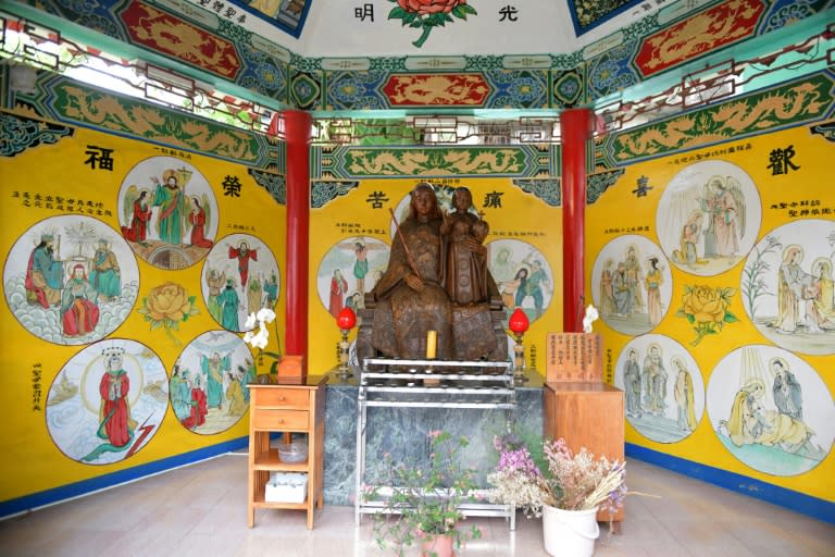 Statues of saints displayed in a Chinese-style pavilion in the Holy Spirit Church