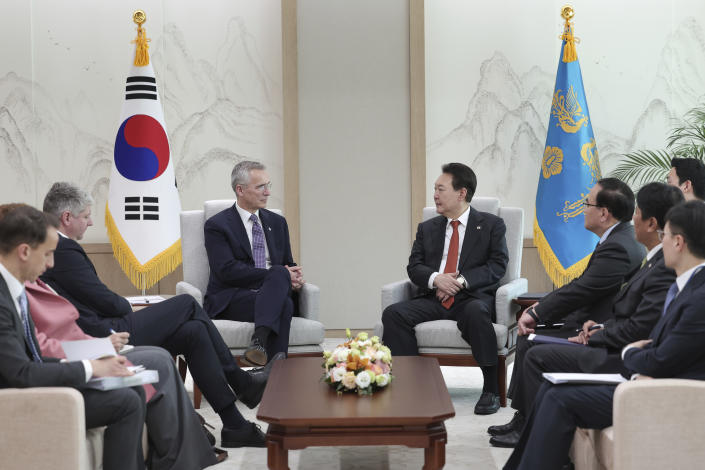 South Korean President Yoon Suk Yeol, center right, talks with NATO Secretary-General Jens Stoltenberg during a meeting at the presidential office in Seoul, South Korea, Monday, Jan. 30, 2023. (South Korea Presidential Office/Yonhap via AP)