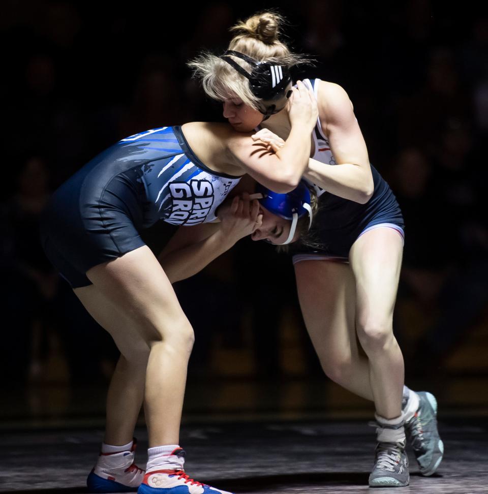 South Western's Natalie Handy (right) wrestles Spring Grove's Emma Hess during the 106-pound bout in a YAIAA Division I wrestling match Jan. 4, 2024, at South Western High School. The Mustangs won, 54-12.