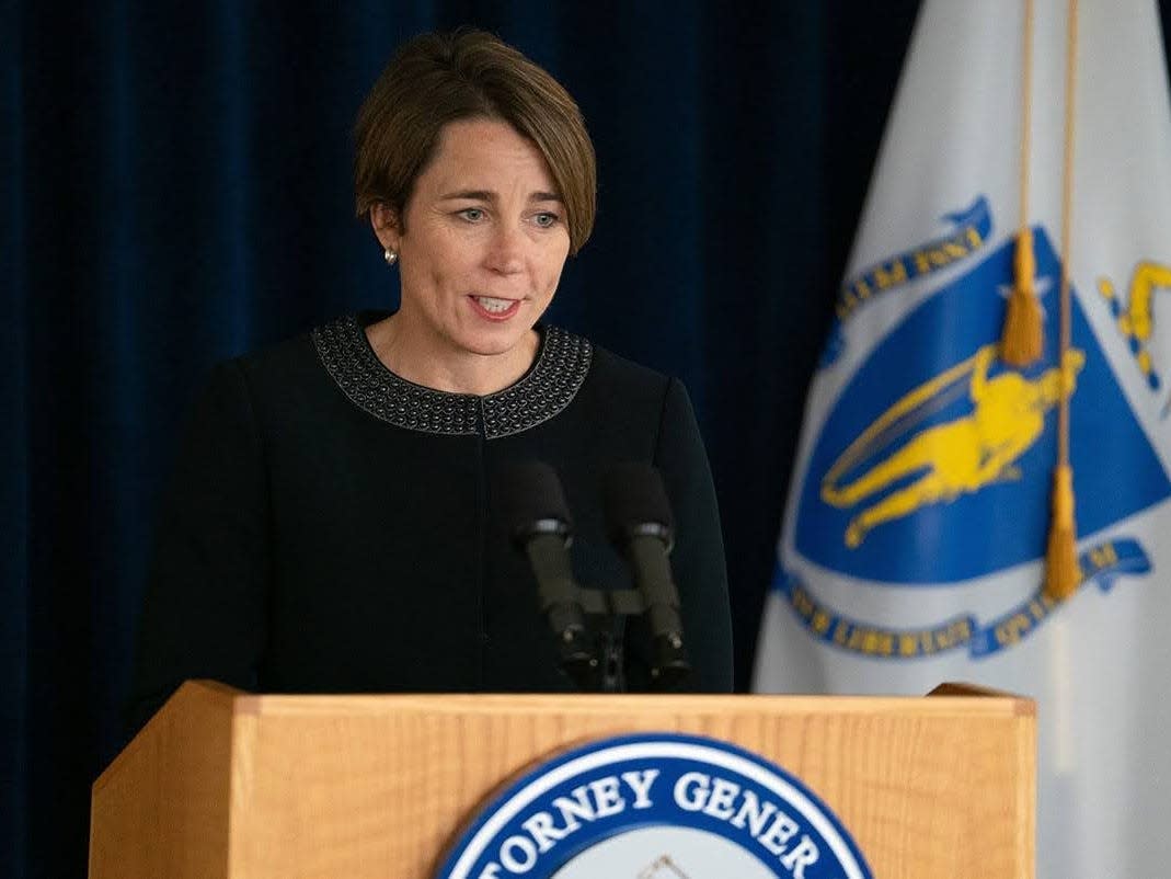 MA Attorney General Maura Healey standing at a podium