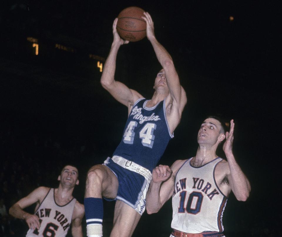 Jerry West goes up for a shot in front of Dave Budd and Mel Peterson of the New York Knicks at Madison Square Garden. (Focus on Sport/Getty Images)