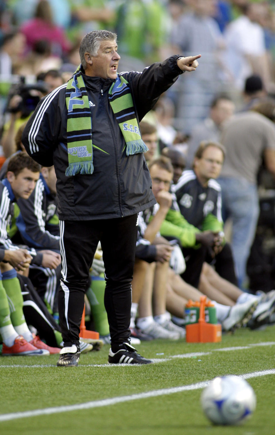 FILE - In this May 30, 2009, file photo, Seattle Sounders coach Sigi Schmid gestures from the sideline during the first half against the Columbus Crew in a MLS soccer match in Seattle. The match was Schmid's first against the Crew since he left the team at the end of the 2008 season to coach the Sounders. Schmid, the winningest coach in MLS history, has died. He was 65. Schmid's family said he died Tuesday, Dec. 25, 2018, at Ronald Reagan UCLA Medical Center in Los Angeles. Schmid was hospitalized three weeks ago as he awaited a heart transplant. (AP Photo/Ted S. Warren, File)
