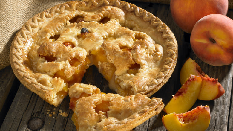 Peach pie with slice out