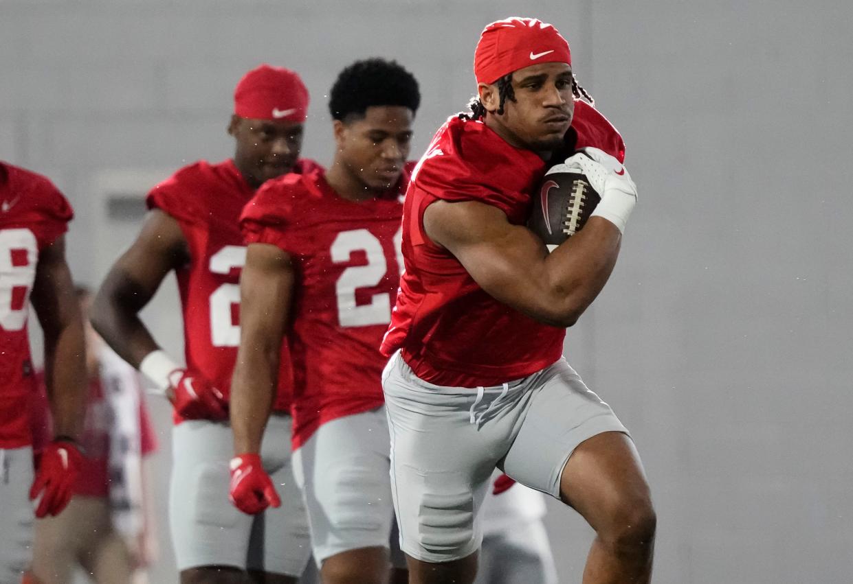 Mar 5, 2024; Columbus, OH, USA; Ohio State Buckeyes running back Dallan Hayden (5) runs during the first spring practice at the Woody Hayes Athletic Center.