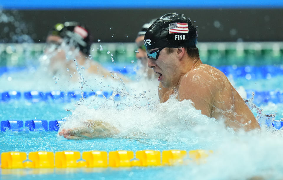 Nic Fink of United States competes in the Men 50m Breaststroke final at the 19th FINA World Championships in Budapest, Hungary, Tuesday, June 21, 2022. (AP Photo/Petr David Josek)