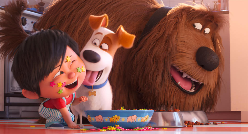 This image released by Universal Pictures shows Liam, voiced by Henry Lynch, from left, Max, voiced by Patton Oswalt, Duke, voiced by Eric Stonestreet in a scene from "The Secret Life of Pets 2." (Illumination Entertainment/Universal Pictures via AP)