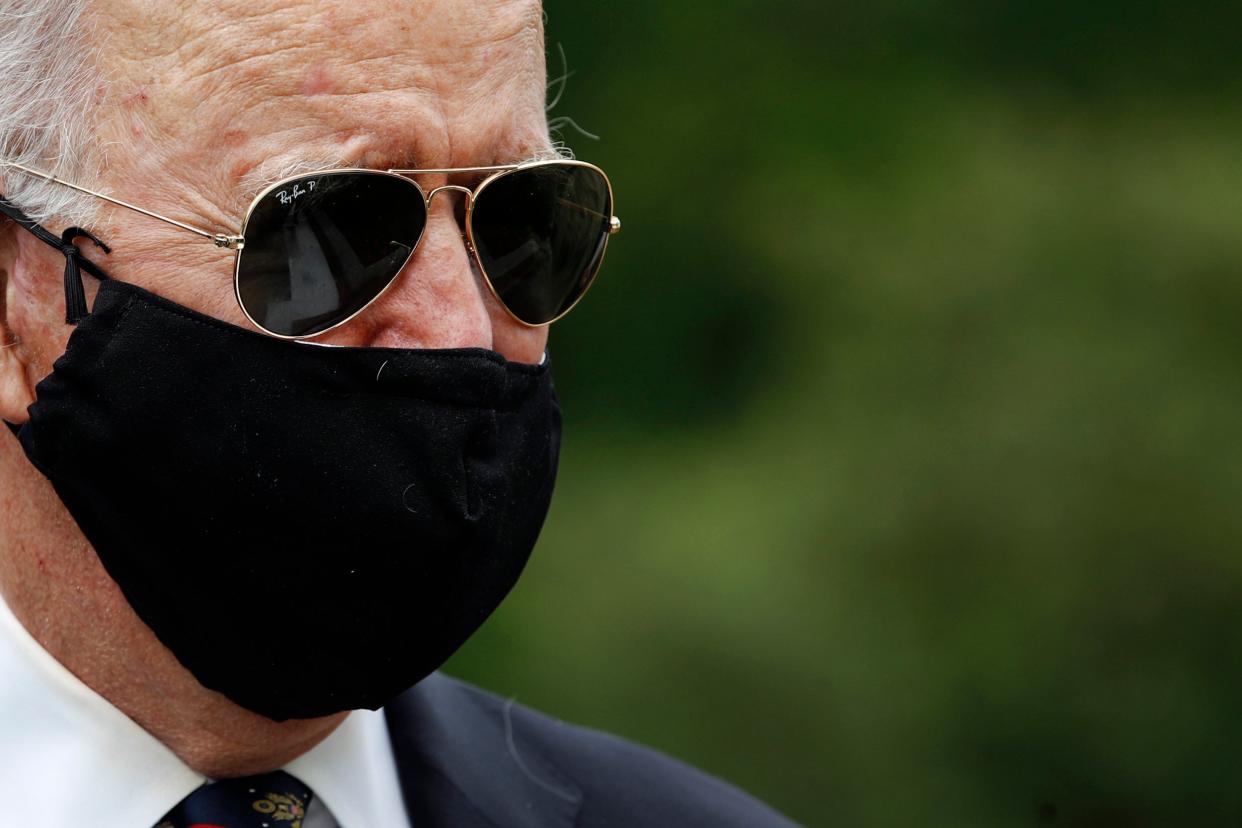 Face-off: Joe Biden made a public appearance this week pointedly wearing a face mask, hitting back at an issue Donald Trump has weaponised: AP