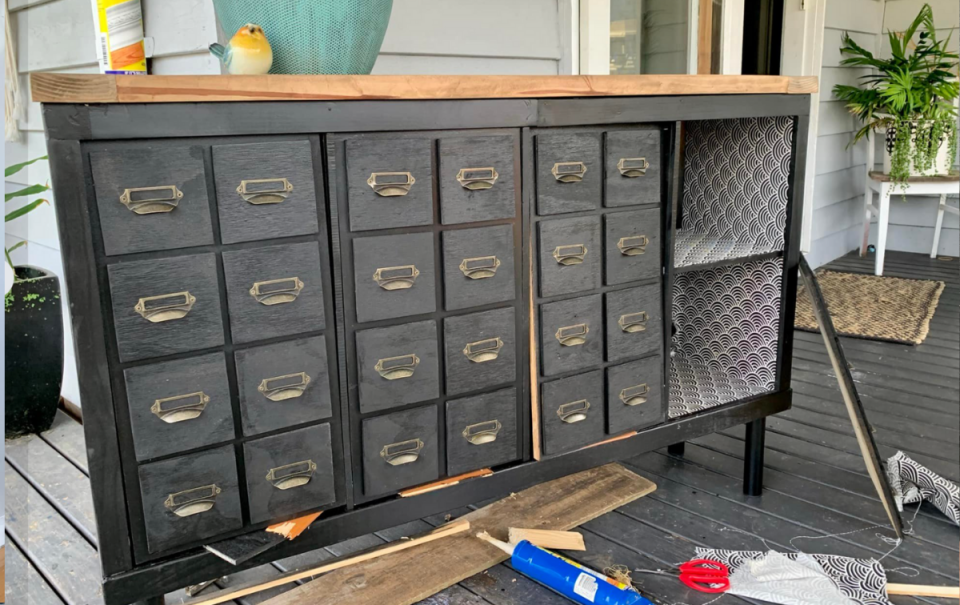 Kmart shelves transformed into apothecary cabinet