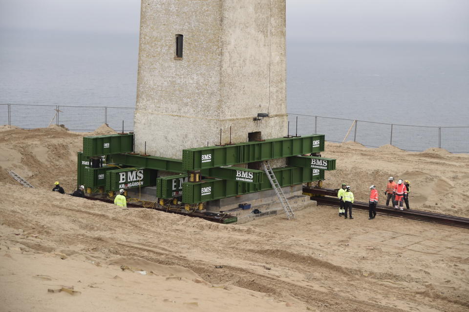 The lighthouse has been placed on wheels and a rail (Picture: AFP/Getty)