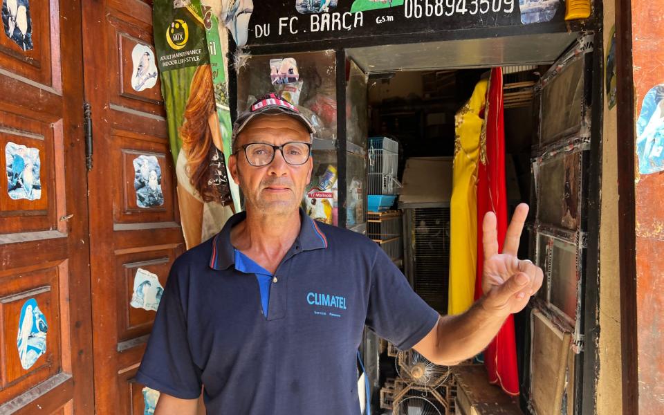 Mustapha a bird shop owner in Marrakesh