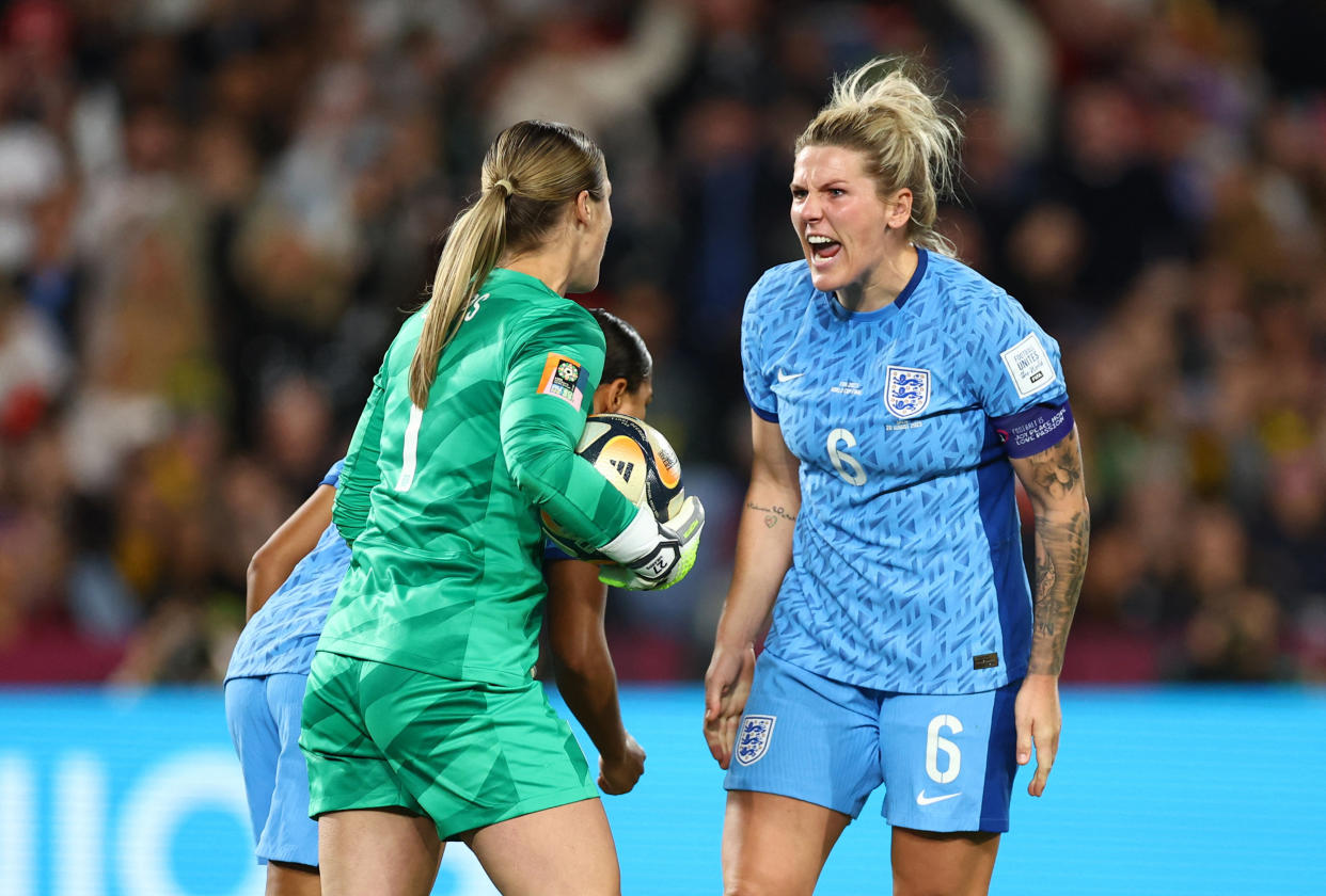 Soccer Football - FIFA Women's World Cup Australia and New Zealand 2023 - Final - Spain v England - Stadium Australia, Sydney, Australia - August 20, 2023 England's Mary Earps celebrates with Millie Bright after saving a penalty kick from Spain's Jennifer Hermoso REUTERS/Hannah Mckay