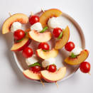 <p>Fresh peaches liven up a classic caprese salad in this super-fast snack. Make this recipe for one or make a bunch for a party appetizer.</p>