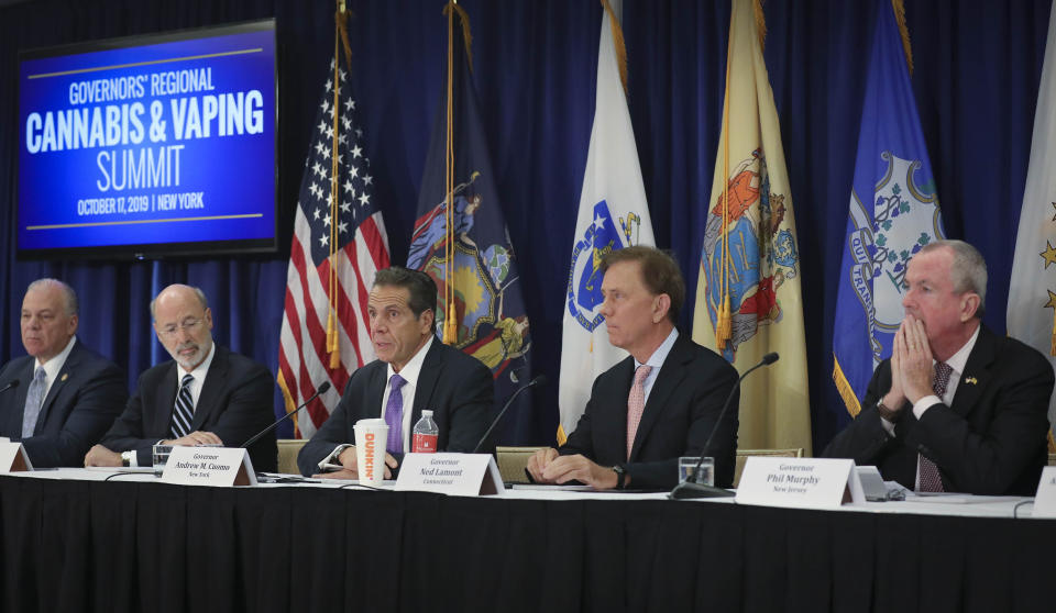 Pennsylvania Gov. Tom Wolf, second from left, New York Gov. Andrew Cuomo, center, Connecticut Gov. Ned Lamont, second from right, and New Jersey Gov. Phil Murphy, far right, co-host a regional summit on public health issues around cannabis and vaping, Thursday Oct. 17, 2019, in New York. (AP Photo/Bebeto Matthews)