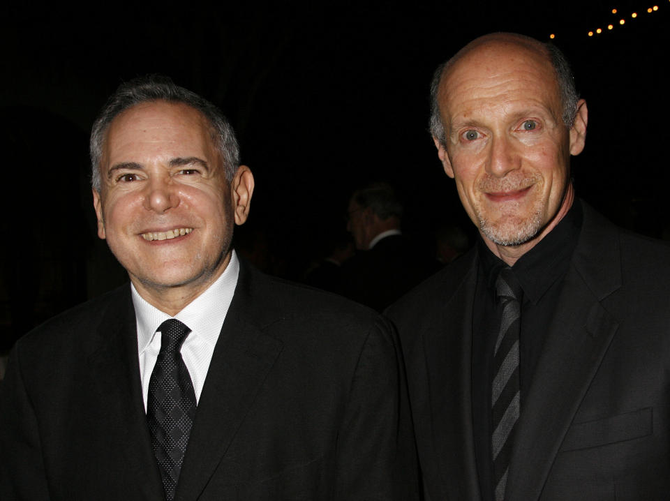 FILE - This Nov. 15, 2007 file photo shows Craig Zadan, left, and Neil Meron, producers of the film "Hairspray" at the Santa Barbara International Film Festival's Kirk Douglas Award for Excellence in Film presented to actor John Travolta in Santa Barbara, Calif. Academy management announced Thursday, Aug. 23, 2012, that Craig Zadan and Neil Meron will produce the 85th annual Oscars, which will air live Feb. 24 on ABC. (AP Photo/Michael A. Mariant, file)