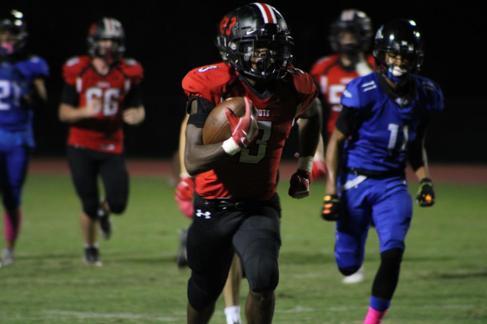 Saint Andrew's running back Bill Young heads to the end zone for one of his four touchdowns in a 55-8 blowout win over Inlet Grove on Oct. 16, 2021.