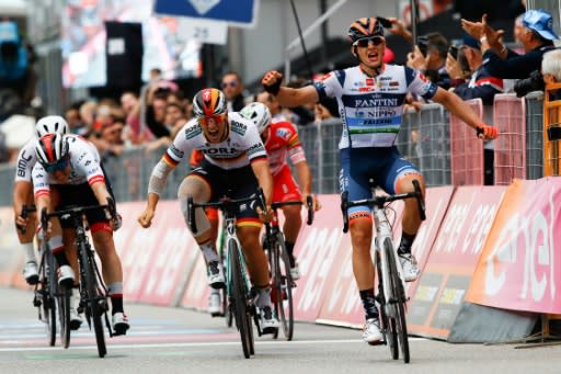 Italian rider Damiano Cima (R) won a sprint for the Giro d'Italia 18th stage