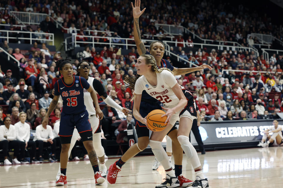 Stanford forward Cameron Brink (22) drives to the basket against Mississippi forward Madison Scott, right during the second half of a second-round college basketball game in the women's NCAA Tournament, Sunday, March 19, 2023, in Stanford, Calif. (AP Photo/Josie Lepe)