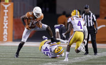 Texas Longhorns wide receiver Brennan Eagles #13 looks for room around LSU Tigers linebacker Michael Divinity Jr. #45 and Todd Harris Jr. #4, Saturday Sept. 7, 2019 at Darrell K Royal-Texas Memorial Stadium in Austin, Tx. LSU won 45-38. ( Photo by Edward A. Ornelas )