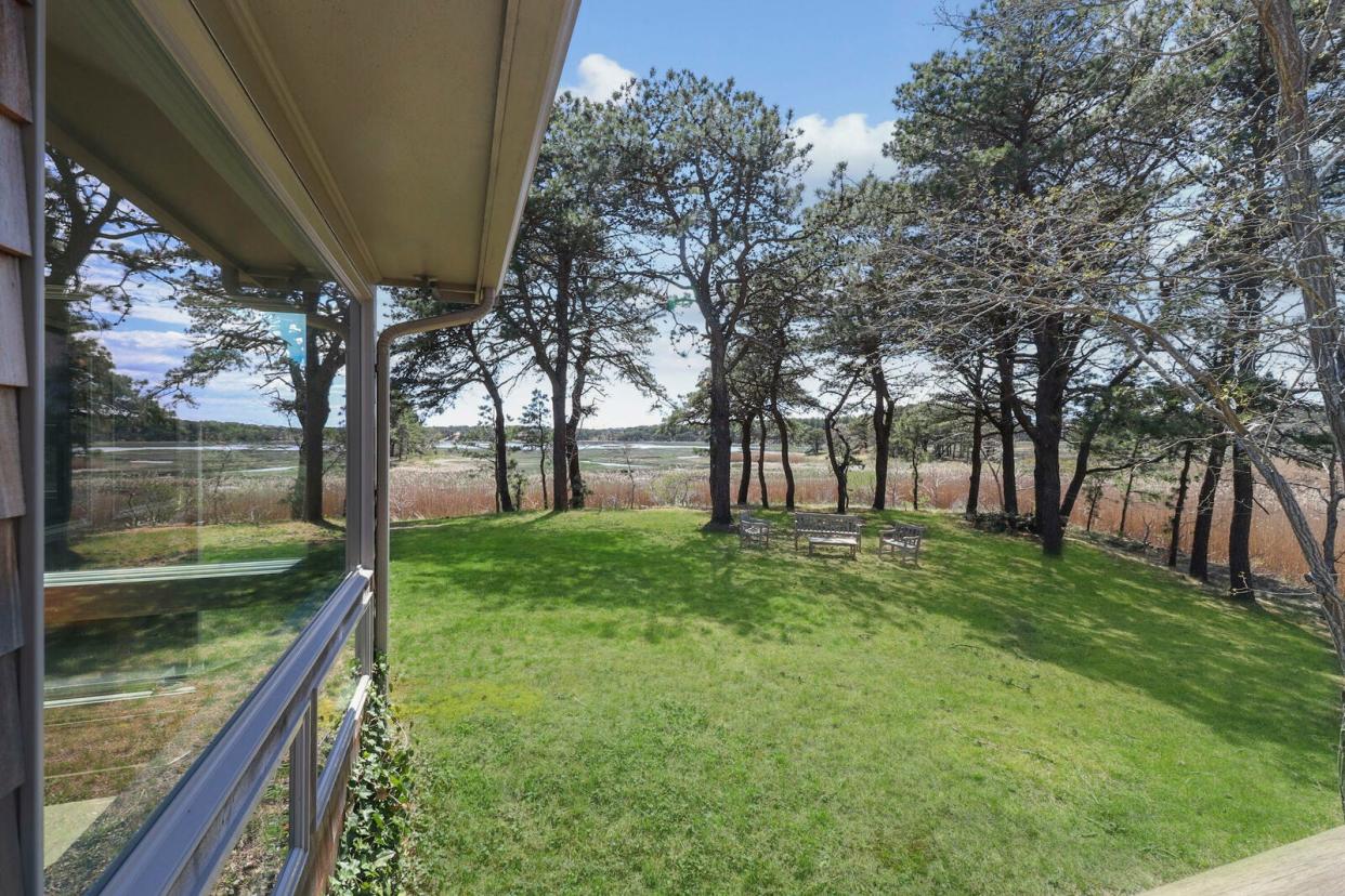 The Wellfleet home offers sweeping views of a beautiful and extensive marsh system.