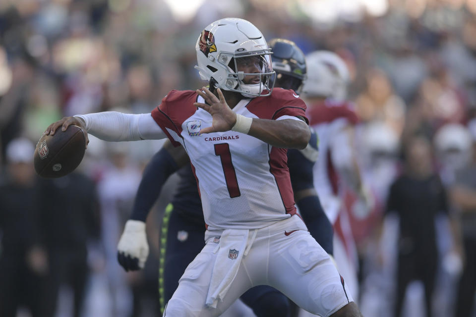 Arizona Cardinals quarterback Kyler Murray (1) passes against the Seattle Seahawks during the second half of an NFL football game in Seattle, Sunday, Oct. 16, 2022. (AP Photo/Caean Couto)