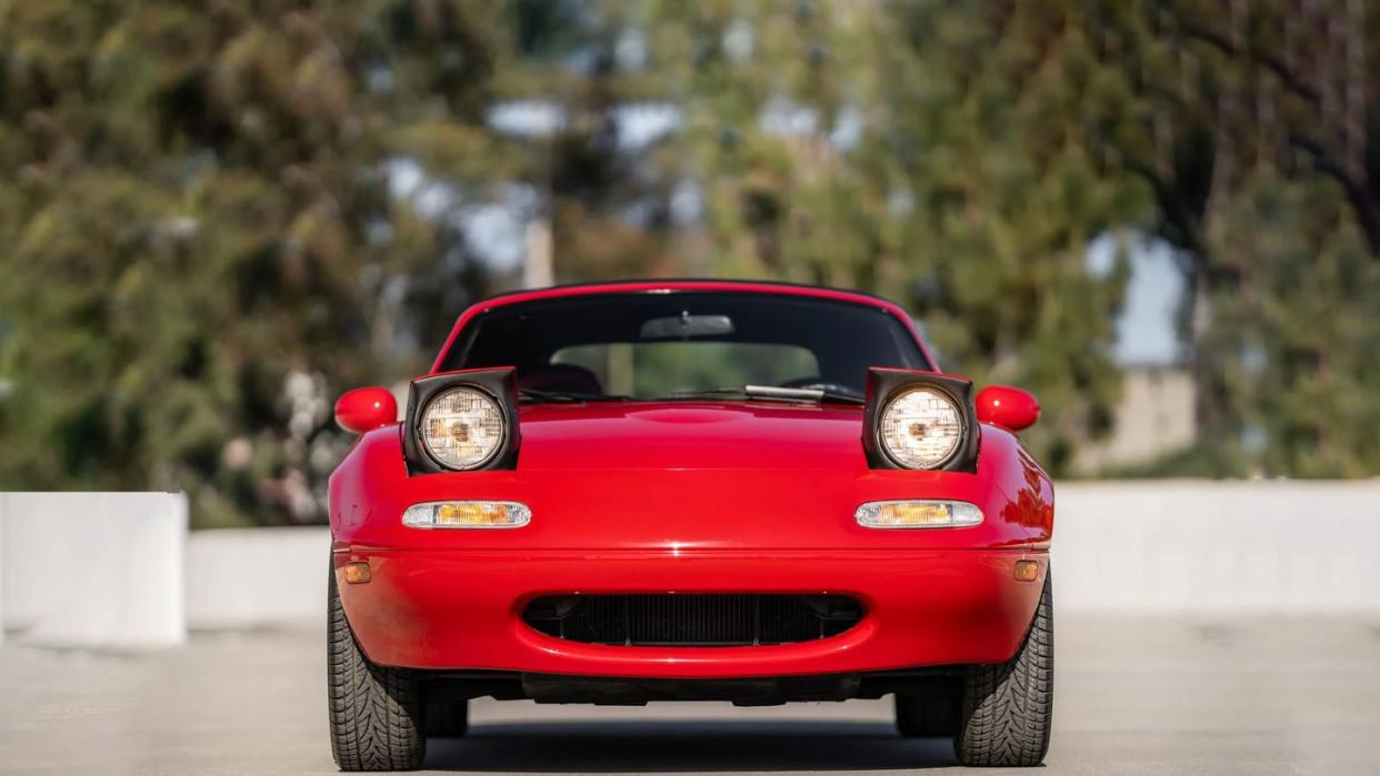 a red car on a road