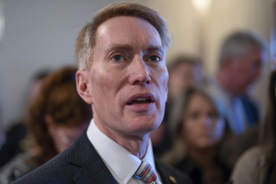 Sen. James Lankford, R-Okla., the lead GOP negotiator on a border-foreign aid package, speaks with reporters outside the chamber at the Capitol in Washington, Thursday, Jan. 25, 2024. Any bipartisan border deal could be doomed because of resistance from former President Donald Trump. (AP Photo/J. Scott Applewhite)