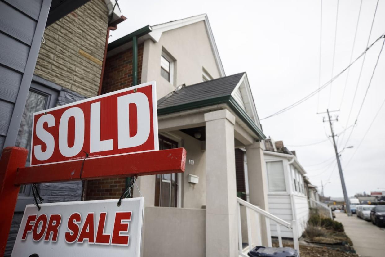 Real-estate title fraud — a bizarre practice where scammers steal a person's identity to refinance or sell their home without the homeowner even knowing — was one of CBC Toronto's most-read subjects of 2023. (Cole Burston/Bloomberg - image credit)