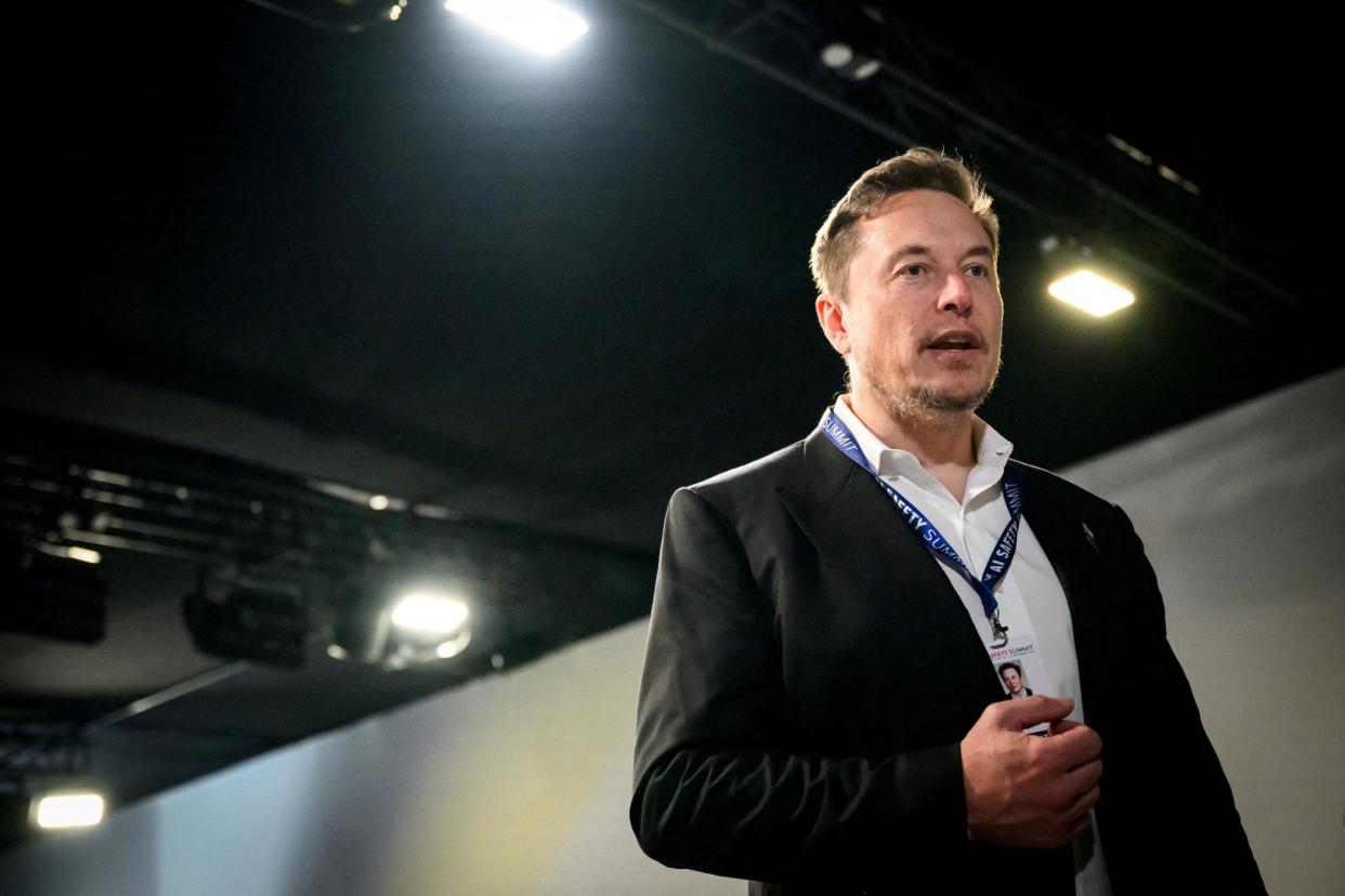 <span>Elon Musk speaks at the AI Safety Summit in Bletchley, Britain, on 1 November 2023.</span><span>Photograph: Leon Neal/Pool via Reuters</span>