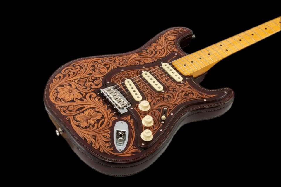 Troy West's "Tooled Leather Fender Stratocaster" is featured in the 24th annual Traditional Cowboy Arts Association Exhibition & Sale at the National Cowboy & Western Heritage Museum in Oklahoma City.