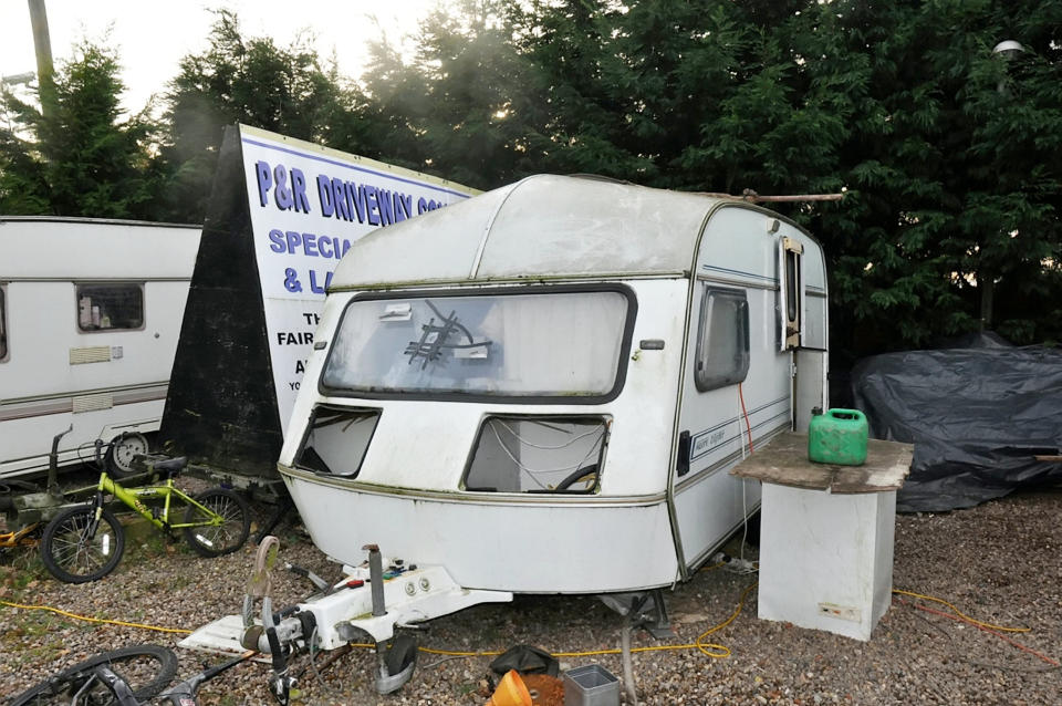 A dilapidated caravan at the Rooney family's site (Picture: SWNS)