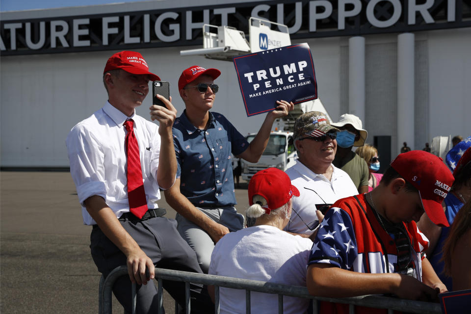 Supporters listen as President Donald Trump speaks during a campaign event with Florida Sheriffs in Tampa, Fla., Friday, July 31, 2020. (AP Photo/Patrick Semansky)