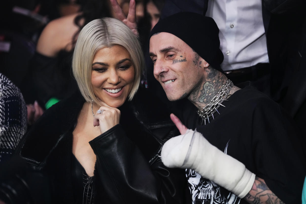 Kourtney Kardashian revealed she is pregnant at one of husband Travis Barker's shows. (Photo: Jeff Bottari/Zuffa LLC via Getty Images)