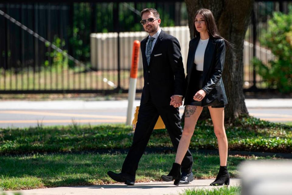 Robert Deming III and his girlfriend arrive at Dan M. Russell Jr. Federal Courthouse in Gulfport on Wednesday, May 1, 2024, for Deming to plead guilty to selling products containing synthetic cannabinoids at his Candy Shop kratom stores.