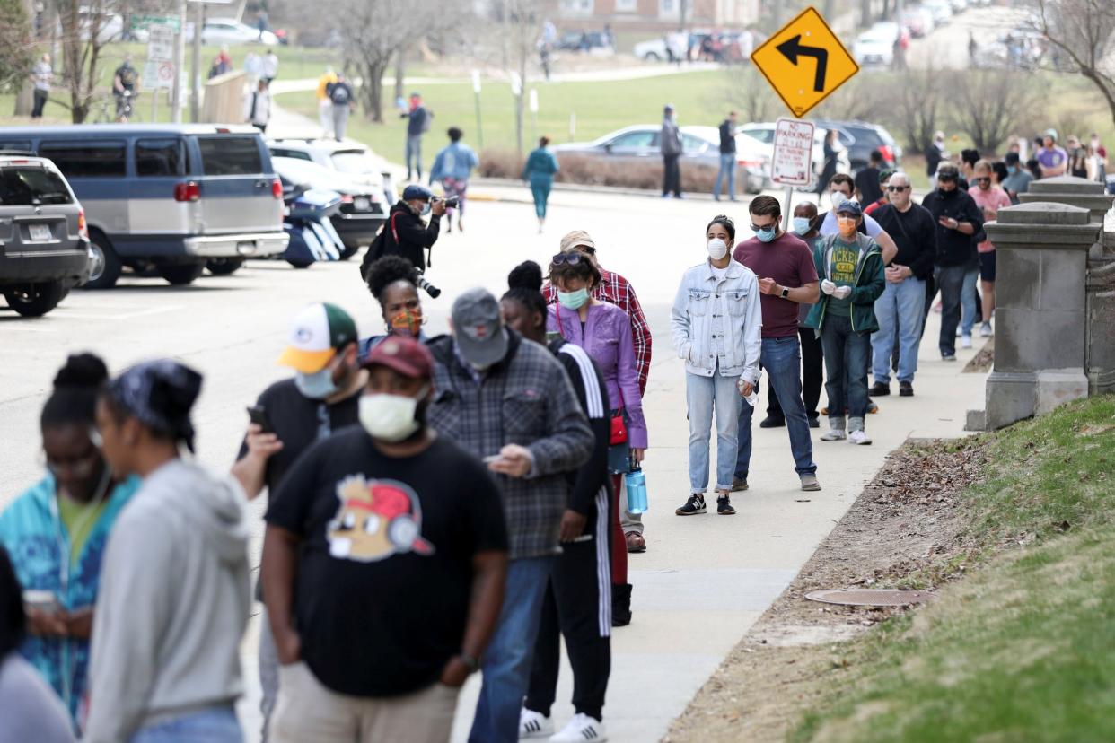 A line of voters outside Riverside University High School in Milwaukee during the Wisconsin primary: REUTERS