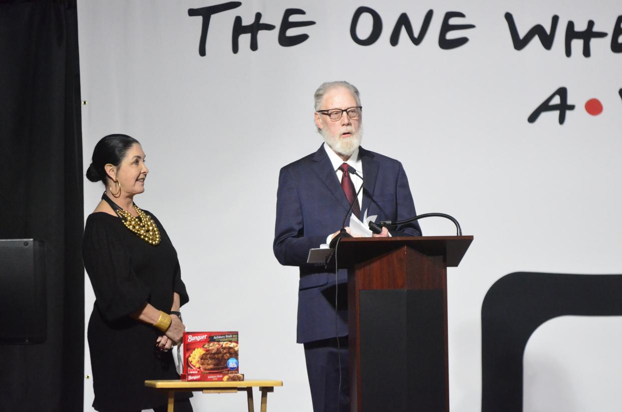 Cheri and David Jetmore give a speech after receiving the Art Vivian Distinguished Community Leader award at the Wayne County Area Chamber of Commerce annual dinner on Jan. 19, 2024. The Jetmores were nominated by Richmond Civic Theatre and have been involved with it for over 40 years, as well as serving other local organizations.