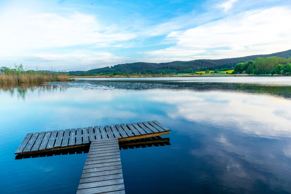 lake with small crooked dock