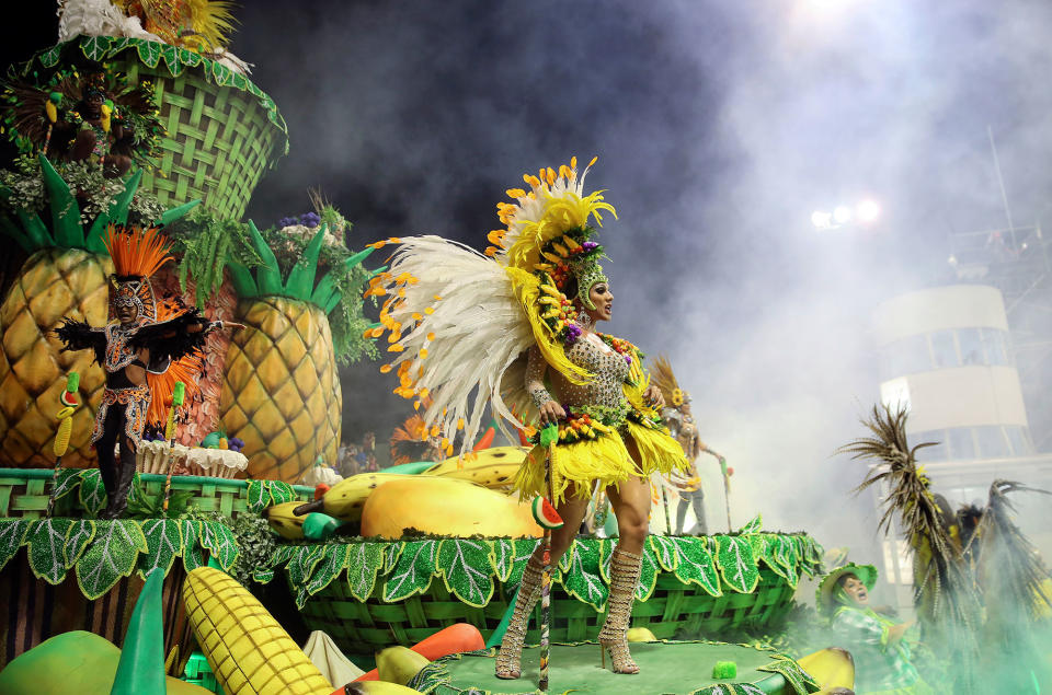 <p>Dancers from the Rosas de Ouro samba school perform on a float during a carnival parade in Sao Paulo, Brazil, Saturday, Feb. 10, 2018. (Photo: Andre Penner/AP) </p>