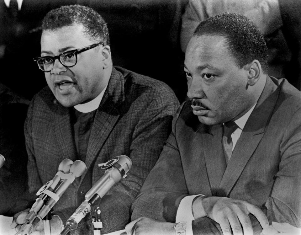 The Revs. James M. Lawson, left, and Martin Luther King Jr. hold a news conference on March 28, 1968, in Memphis.